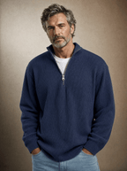 Premium half-zip ribbed pullover in navy, worn with jeans