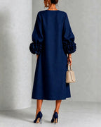 Rosemary rosette-cuff midi dress in navy, back view