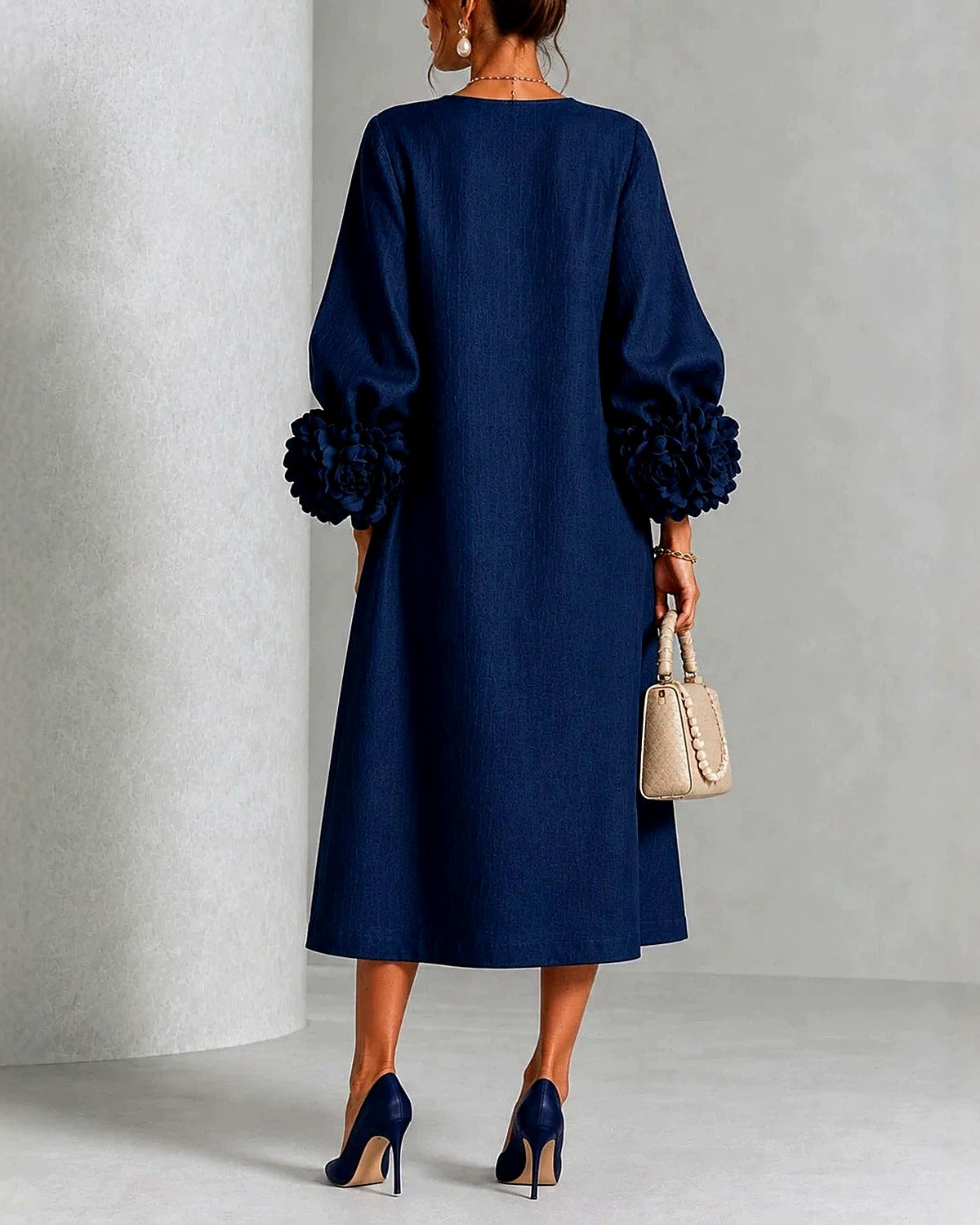 Rosemary rosette-cuff midi dress in navy, back view